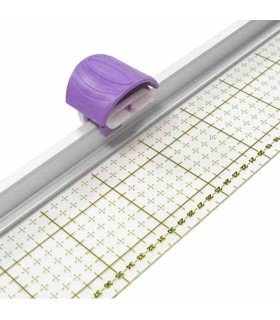 Ruler with rotary cutter